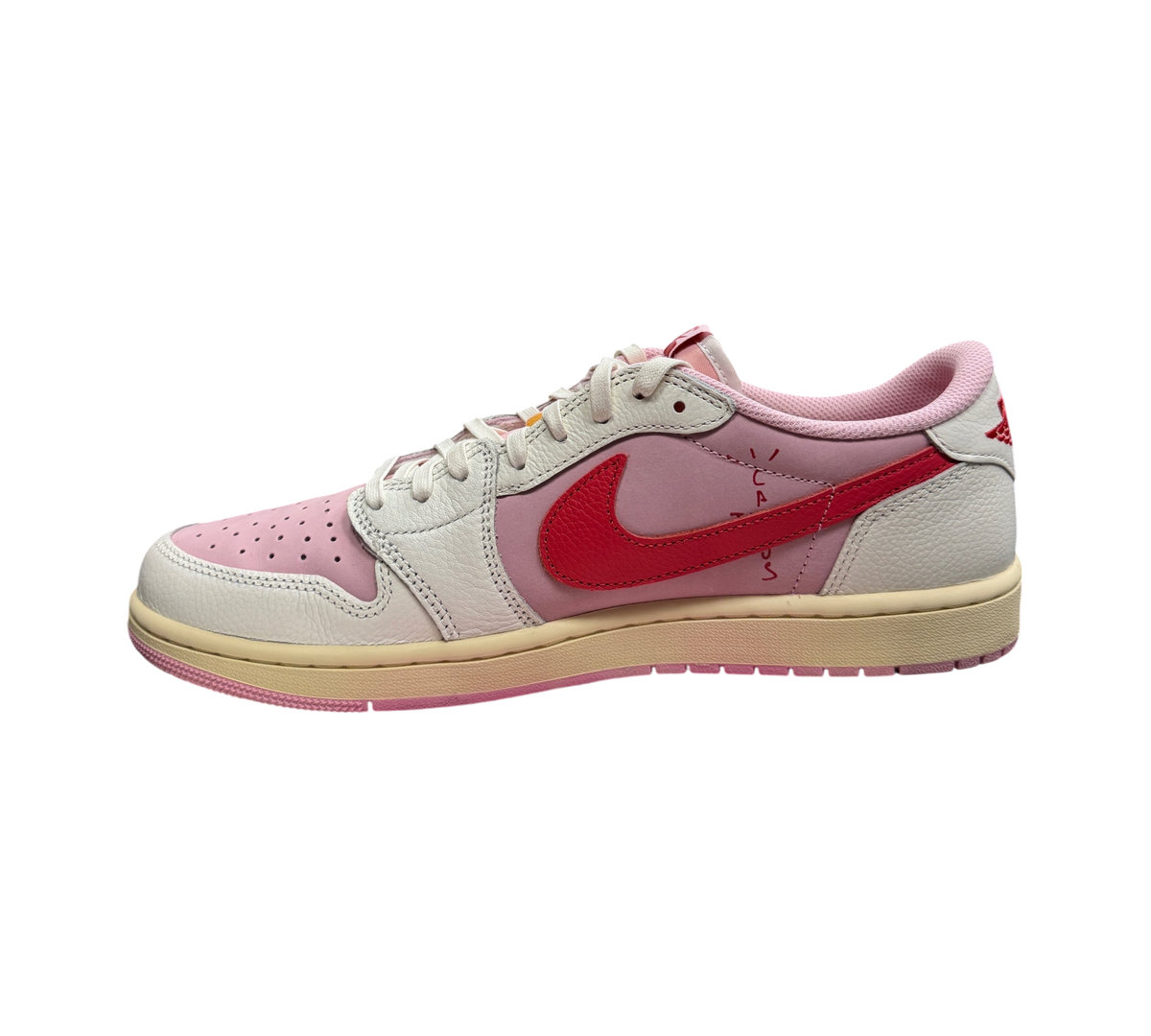 Genesis Boutique Jordan 1 Low Travis Scott Tropical Pink sneaker with pink and white leather upper and red swoosh