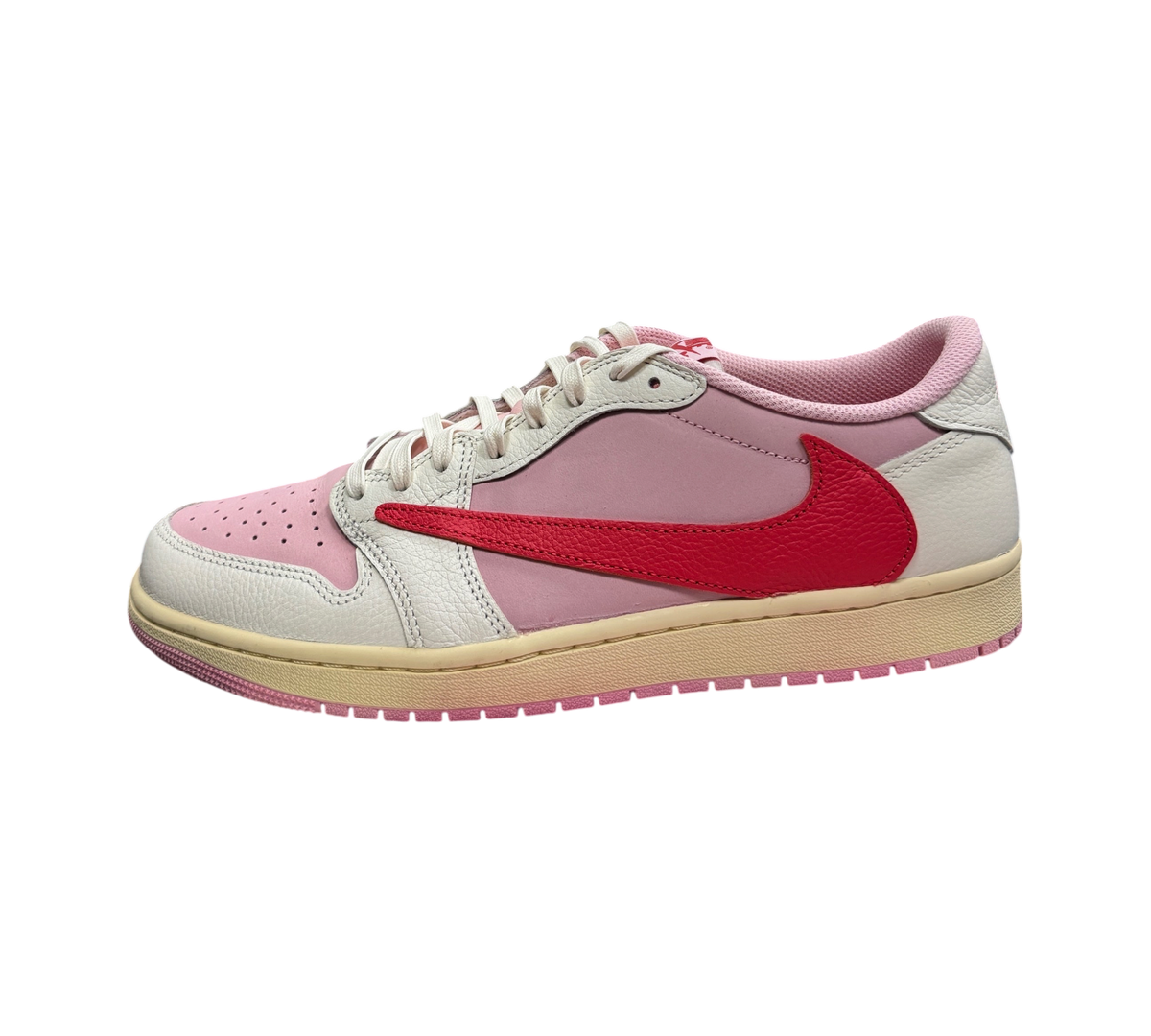 Genesis Boutique Jordan 1 Low Travis Scott Tropical Pink sneakers with signature reverse swoosh and pink accents