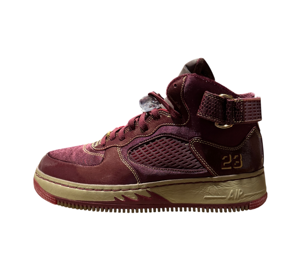 Genesis Boutique Jordan 5 Fusion Wine & Grind sneakers in burgundy suede with gold accents and side strap detail