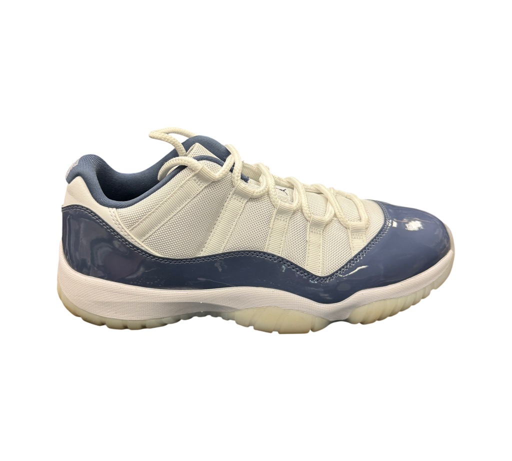 Genesis Boutique Air Jordan 11 Low Diffused Blue sneaker with white mesh upper and blue patent leather mudguard