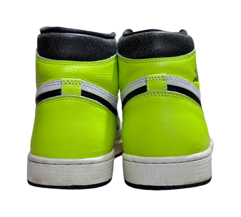 Genesis Boutique Jordan 1 High Visionaire sneakers in neon yellow and black leather, rear view showing heel detail