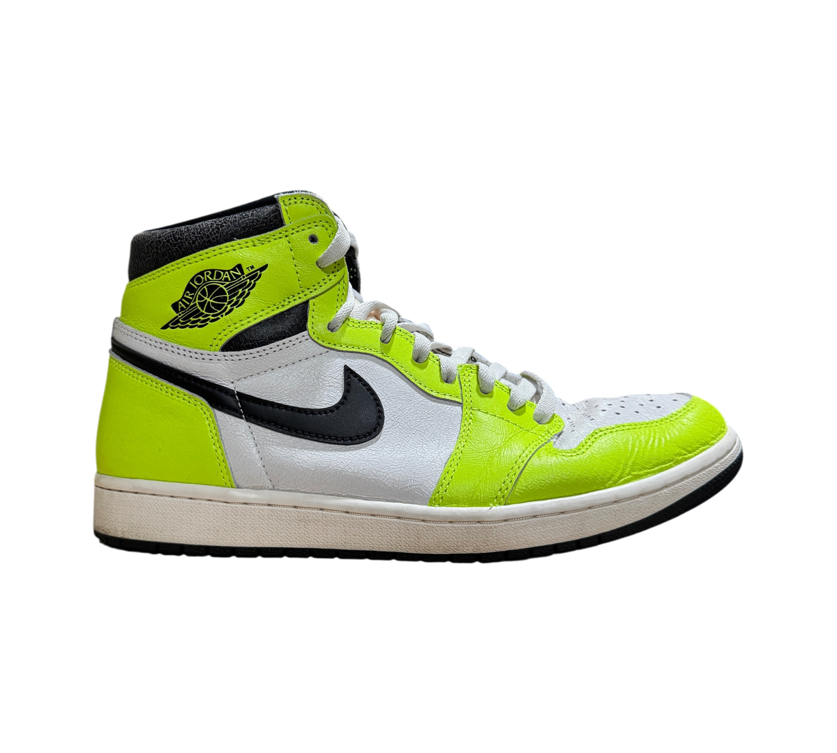 Genesis Boutique Jordan 1 High Visionaire sneakers in neon yellow, white, and black leather with slight creasing.