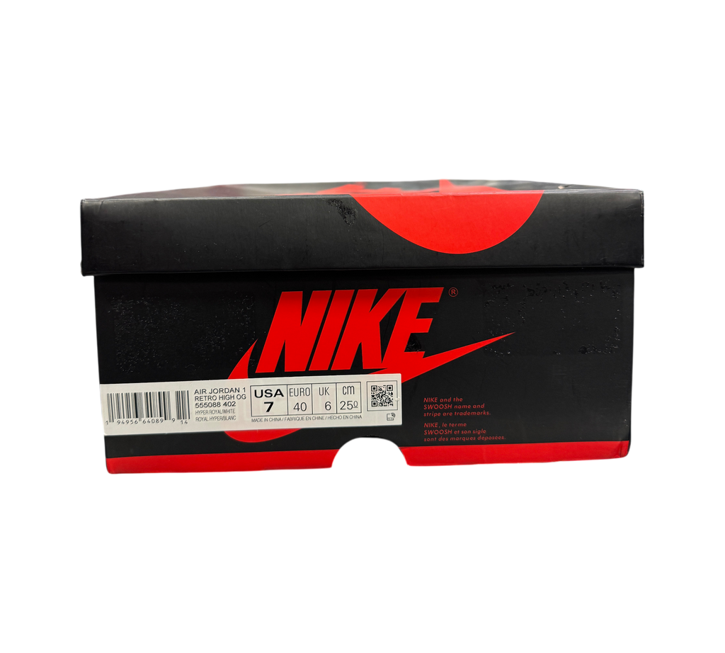 Genesis Boutique Jordan 1 Hyper Royal shoe box with Nike branding and size label on a retail shelf