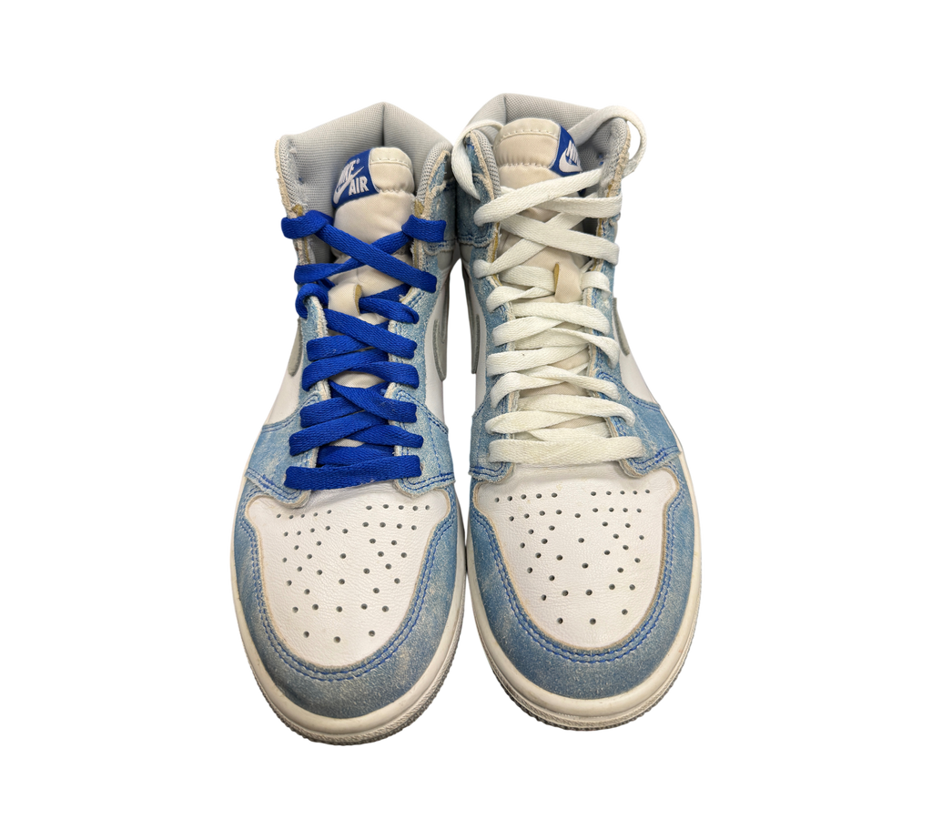 Genesis Boutique Jordan 1 GS Hyper Royal sneakers with mismatched blue and white laces on a display box
