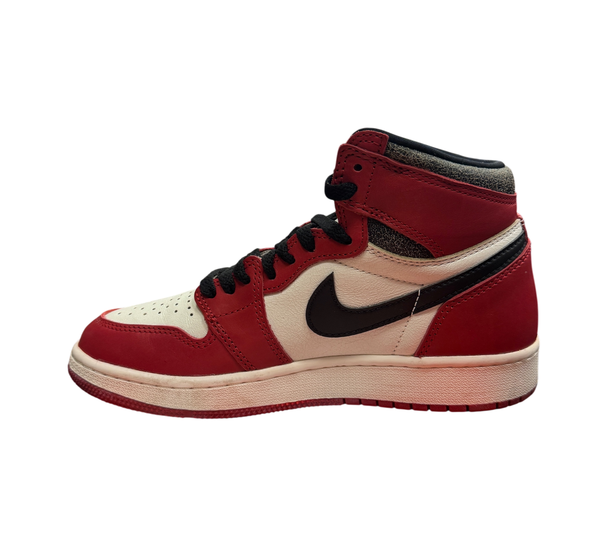 Genesis Boutique Jordan 1 GS Lost and Found high-top sneakers in red, white, and black leather on a Nike shoebox