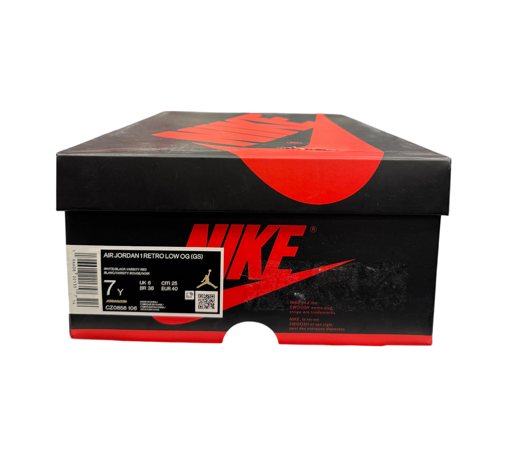 Genesis Boutique Jordan 1 Low Black Toe sneaker box with size label visible in a retail store setting