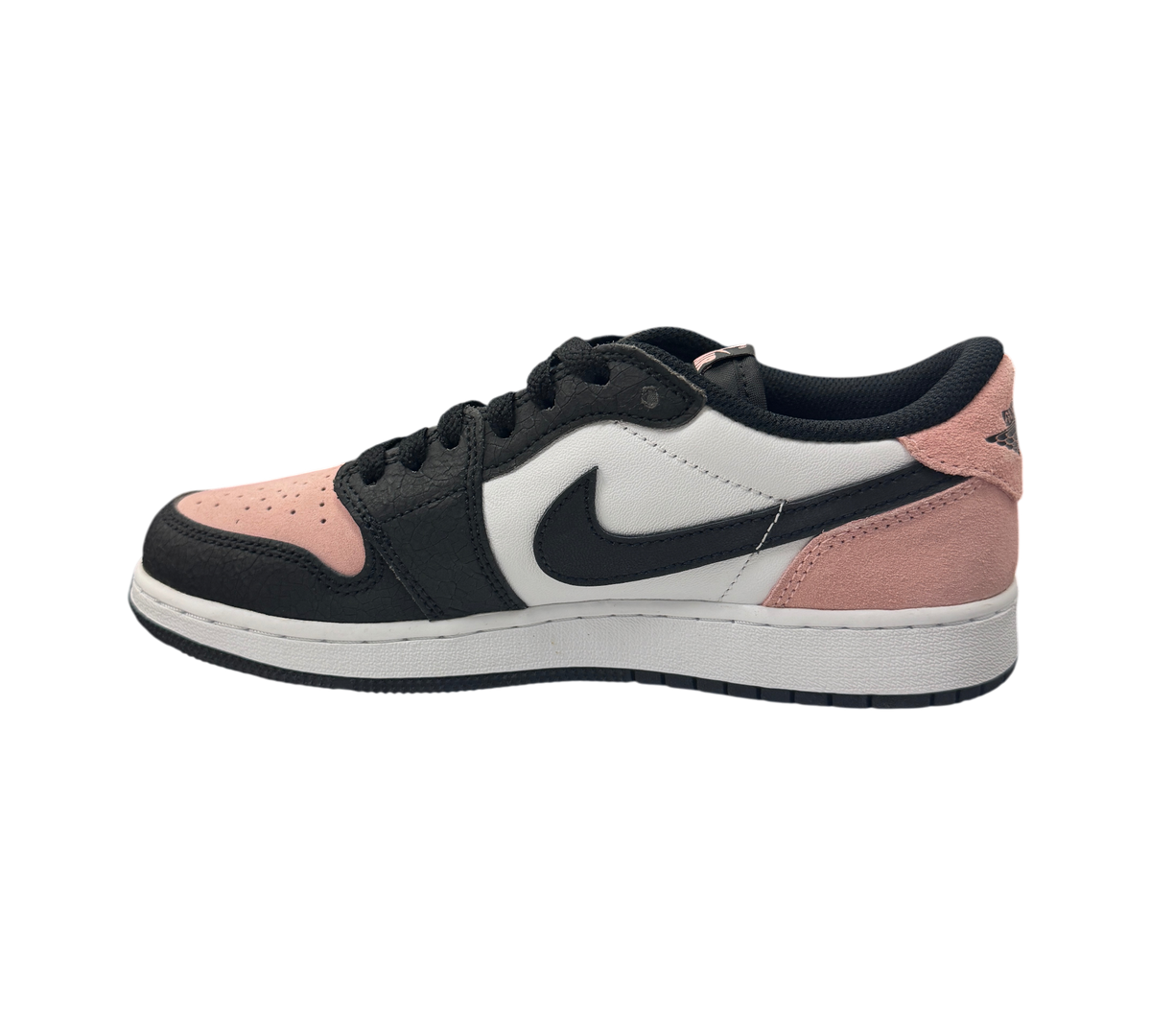 Genesis Boutique Jordan 1 Low GS Bleached Coral sneakers in black, white, and pink suede with a side profile view.
