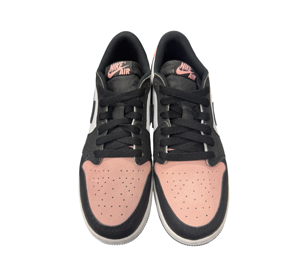 Genesis Boutique Jordan 1 Low GS Bleached Coral sneakers featuring black leather and pink suede panels
