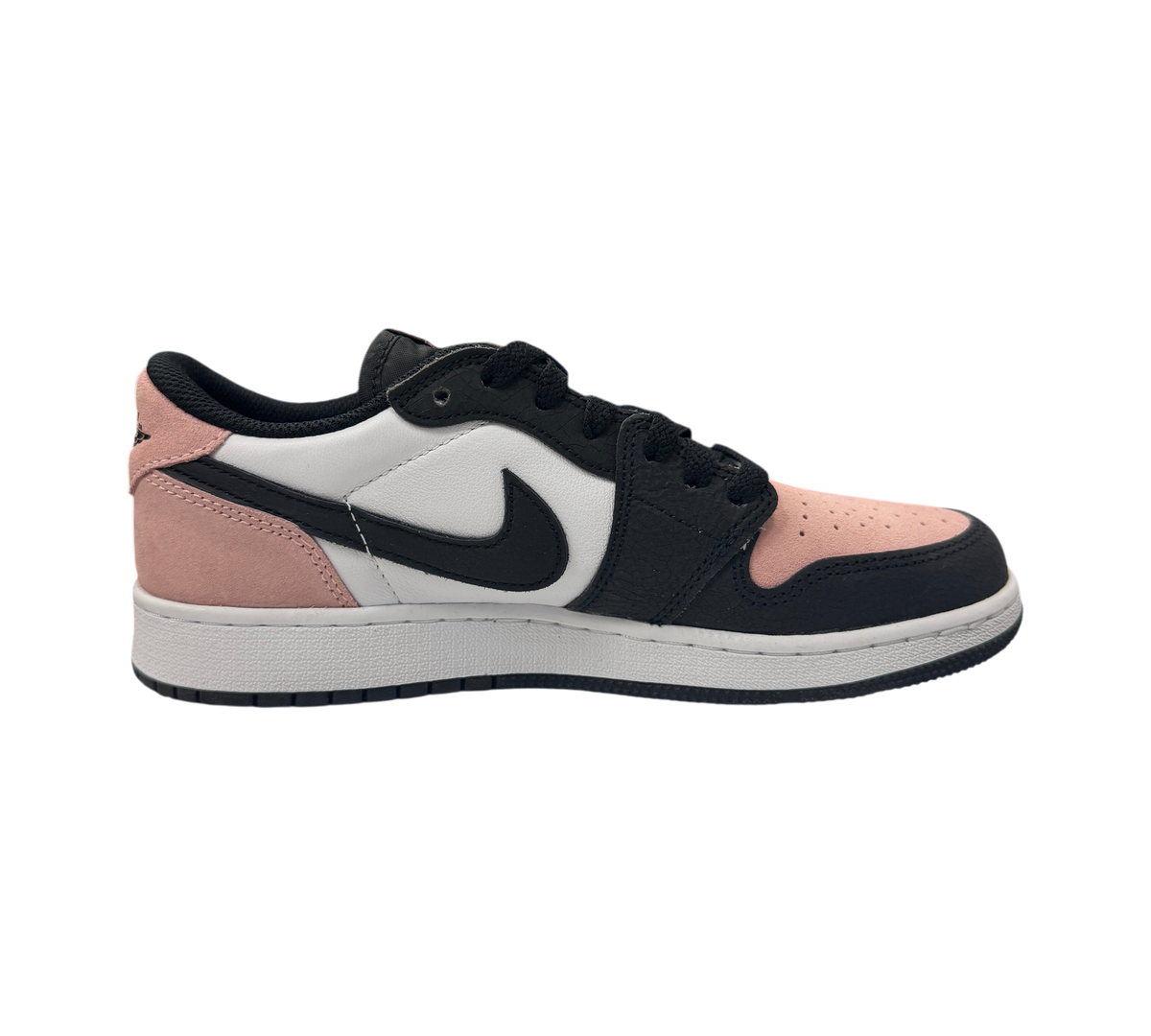 Genesis Boutique Jordan 1 Low GS Bleached Coral sneakers featuring black, white, and pink suede panels.