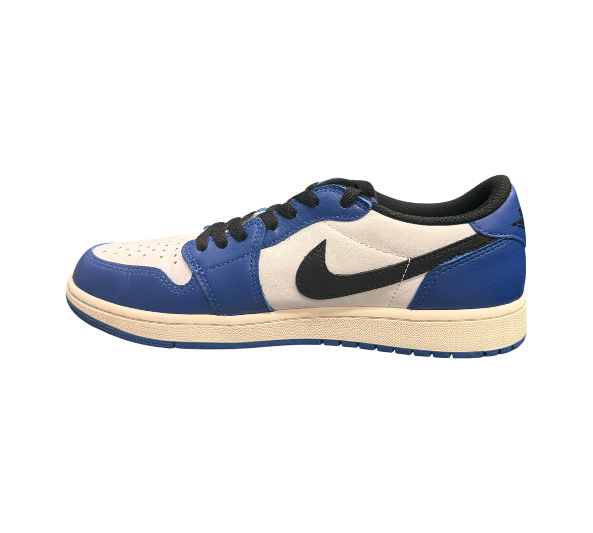 Genesis Boutique Jordan 1 Low Game Royal sneakers with white leather and royal blue overlays, black swoosh.