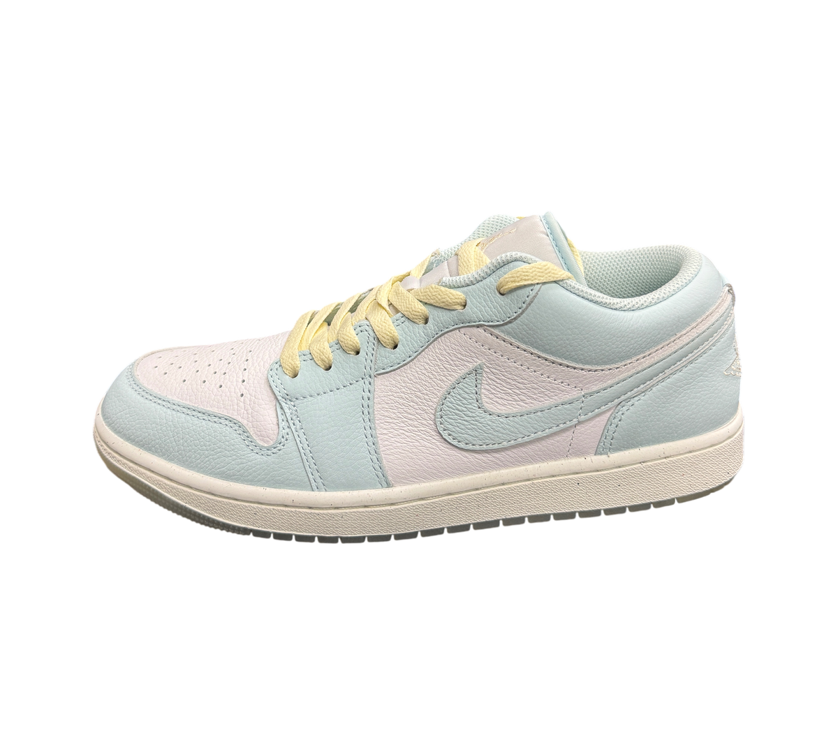 Genesis Boutique Jordan 1 Low Glacier Summit White sneakers in pastel blue and white leather with yellow laces.