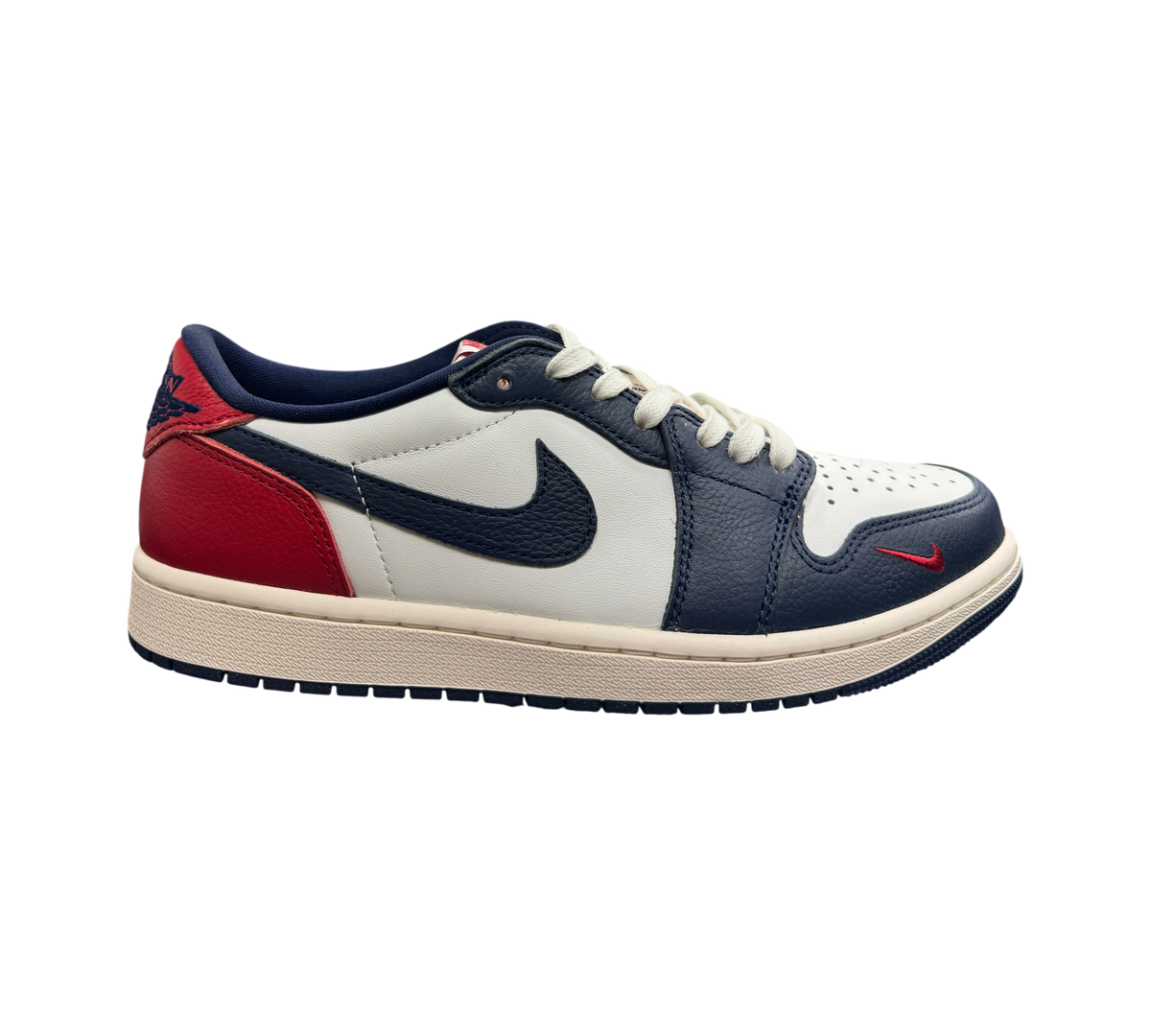 Genesis Boutique Jordan 1 Low Howard Uni sneakers in white, navy blue, and red leather with a side swoosh