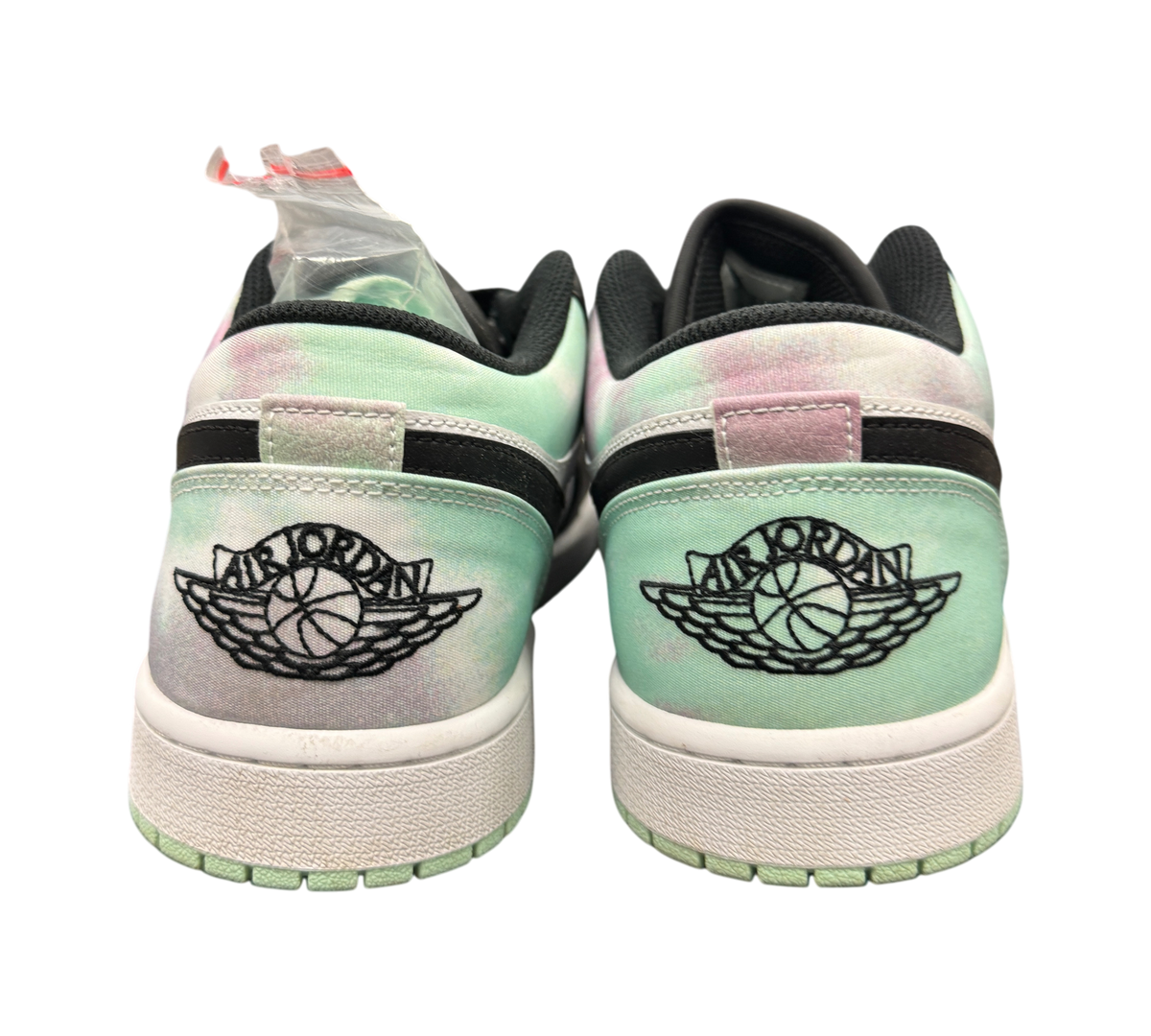 Genesis Boutique Jordan 1 Low Mint Foam sneakers featuring a tie-dye pastel green and purple heel with black logo