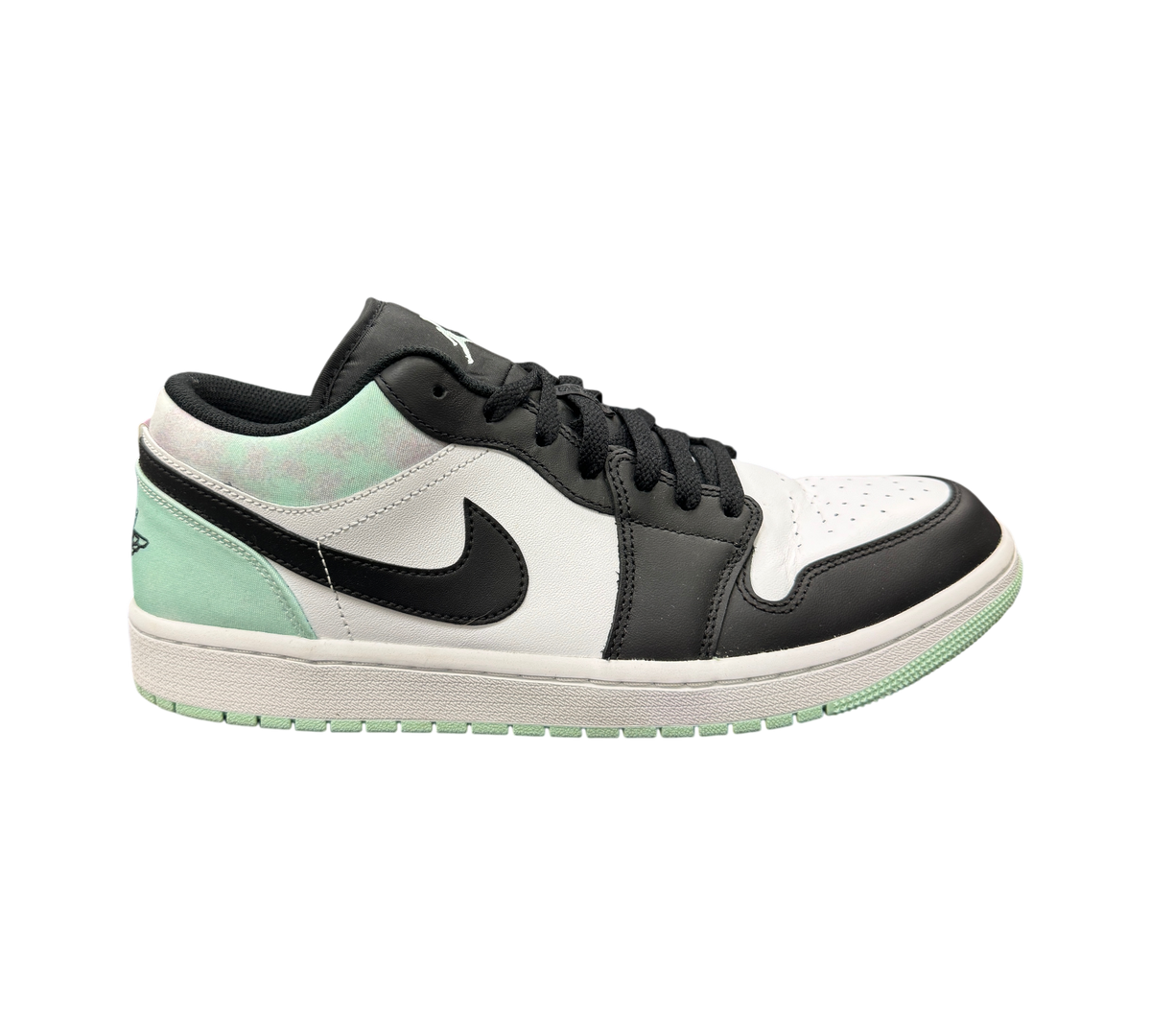 Genesis Boutique Jordan 1 Low Mint Foam sneakers featuring white, black, and mint green leather panels.