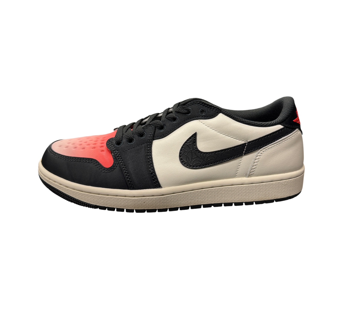 Genesis Boutique pre-owned Jordan 1 Low PSG sneakers in white, black, and red with textured Swoosh on display.