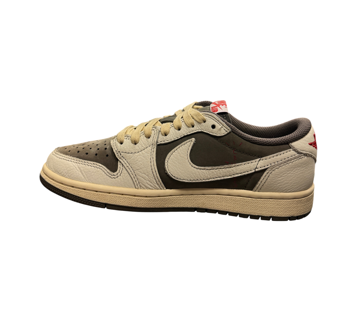 Genesis Boutique Jordan 1 Low Travis Scott Reverse Mocha sneakers in brown and off-white leather with side swoosh