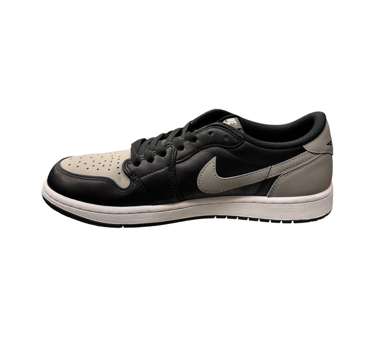 Genesis Boutique pre-owned Jordan 1 Low Shadow sneakers in black and grey leather with a white midsole.
