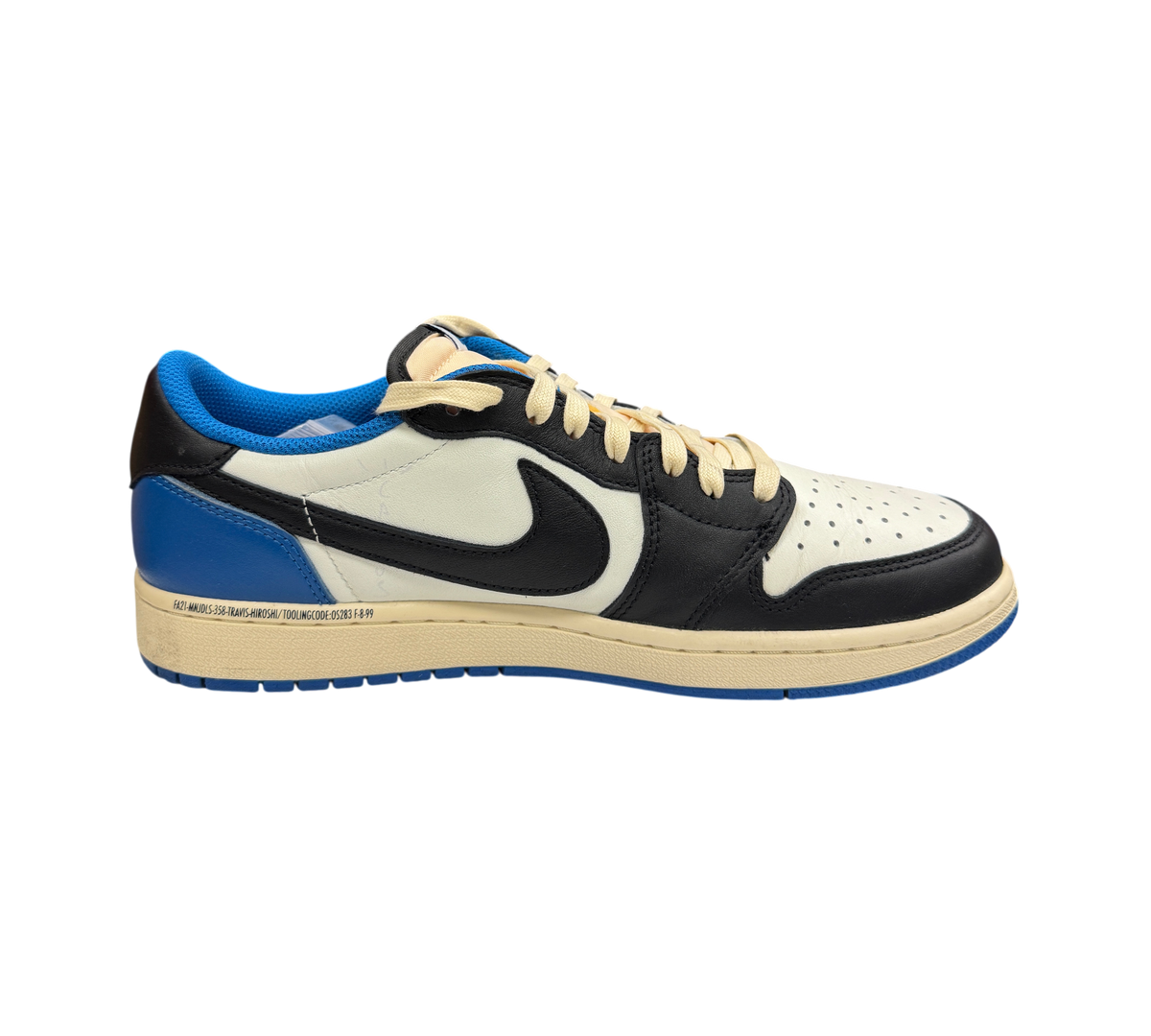 Genesis Boutique Jordan 1 Low Travis Scott Fragment sneaker in white, black, and royal blue with cream laces