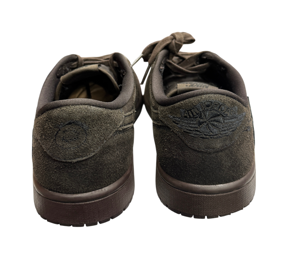 Genesis Boutique Jordan 1 Low Travis Scott Velvet Brown sneakers showing the dark brown suede heel and branding details.