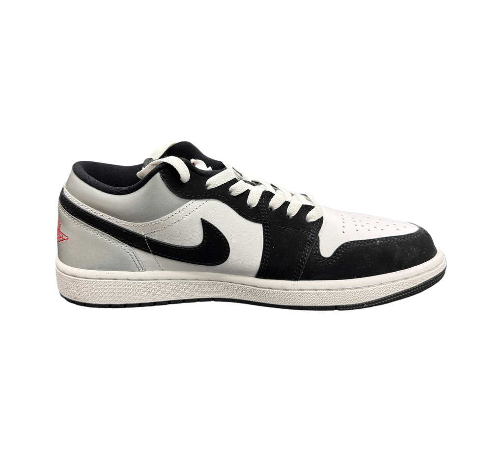 Genesis Boutique Jordan 1 Low sneaker in white, fire red, black, and matte silver with iconic swoosh branding.