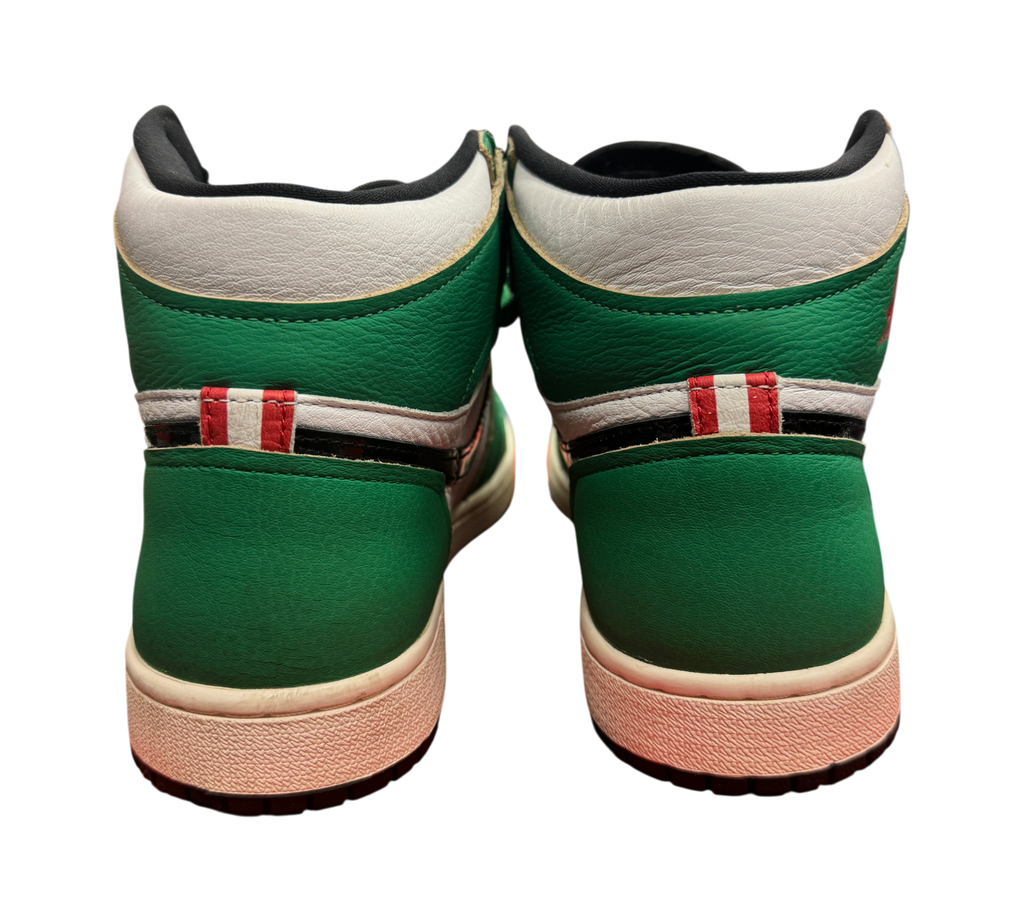Genesis Boutique Jordan 1 High Lucky Green sneakers showing the green and white leather heel detail