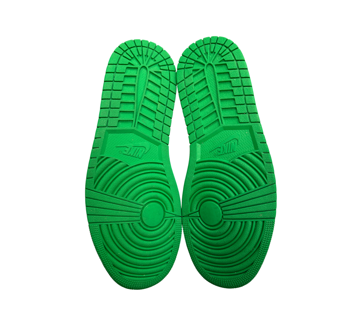 Genesis Boutique Jordan 1 WMNS Mid Lucky Green Aquatone sneakers showing the bright green rubber traction outsoles.