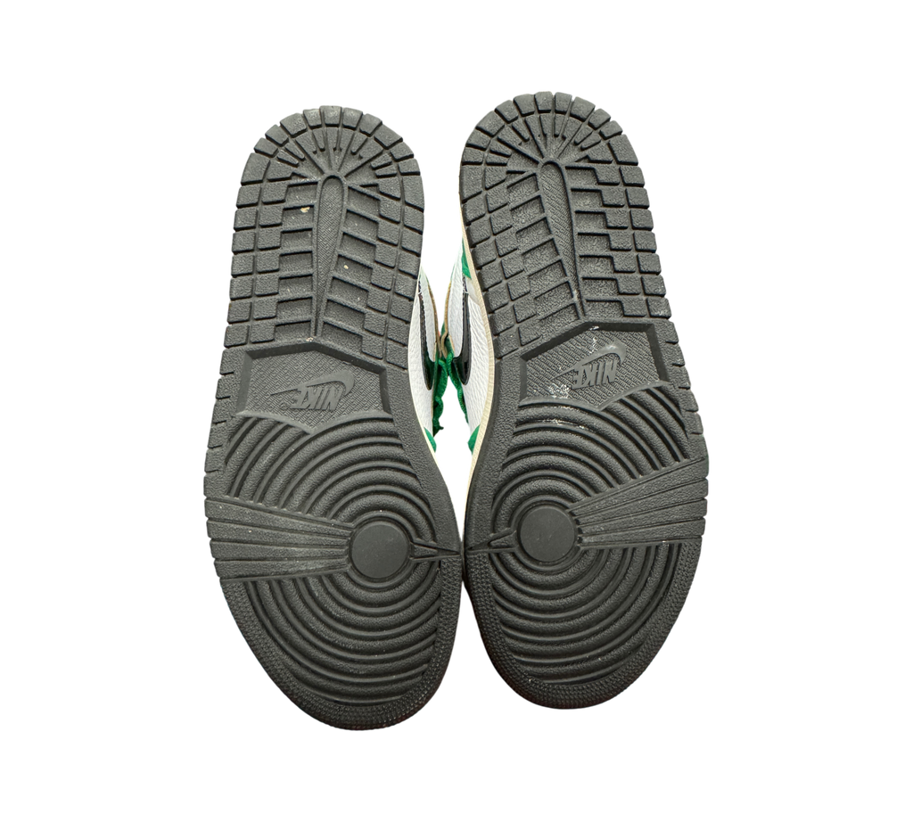 Genesis Boutique used Jordan 1 High Lucky Green sneakers showing black rubber outsoles with circular traction pattern