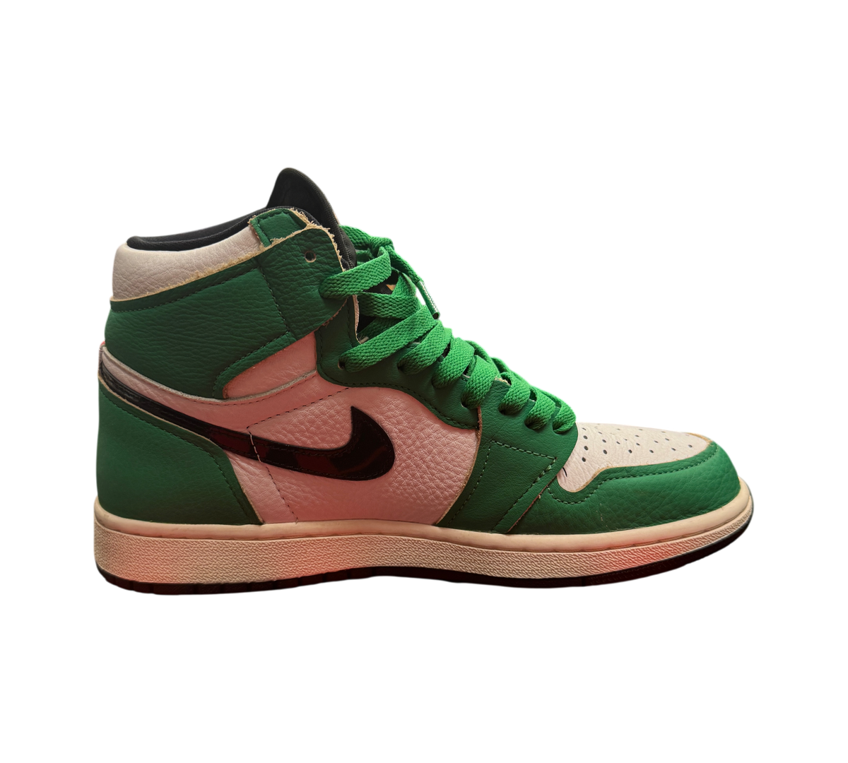 Genesis Boutique Jordan 1 High Lucky Green sneakers in white and green leather with a black swoosh on a Nike box