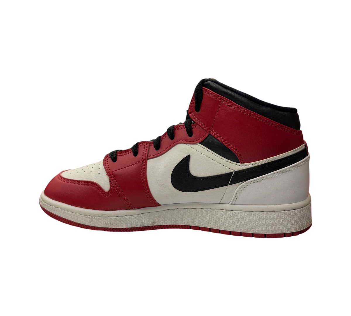 Genesis Boutique Jordan 1 Mid GS Chicago sneakers in red, white, and black leather, shown from a side profile view.