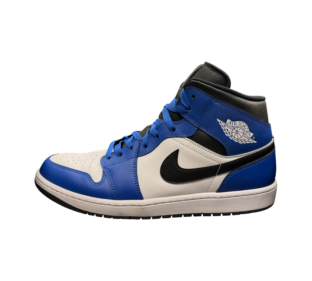 Genesis Boutique Jordan 1 Mid Game Royal sneakers featuring blue, white, and black leather panels with side logo