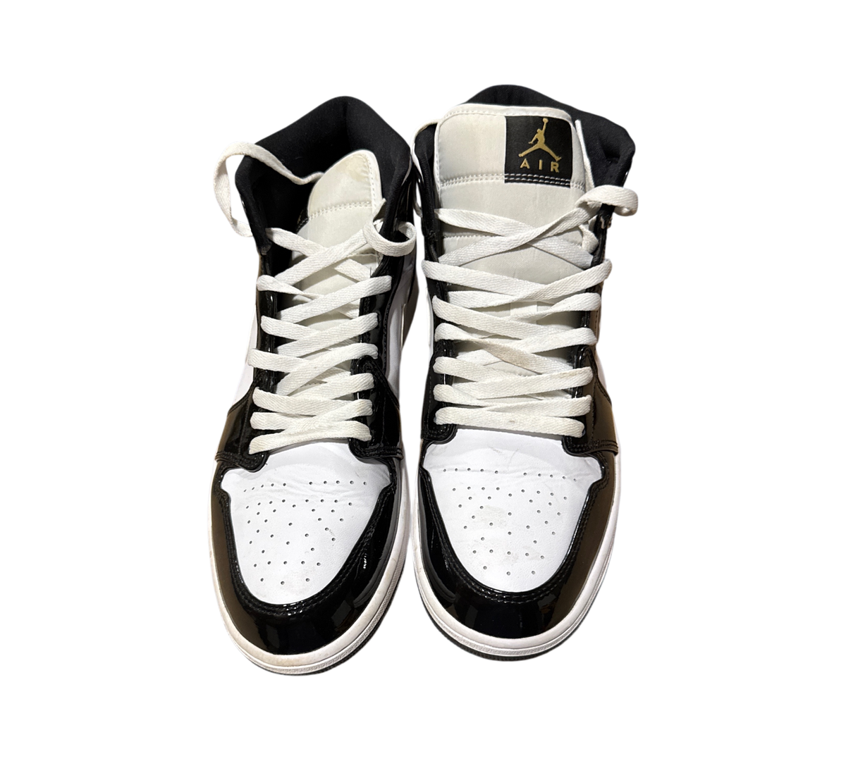 Genesis Boutique Jordan 1 Mid Metallic Gold sneakers in black and white patent leather with white laces