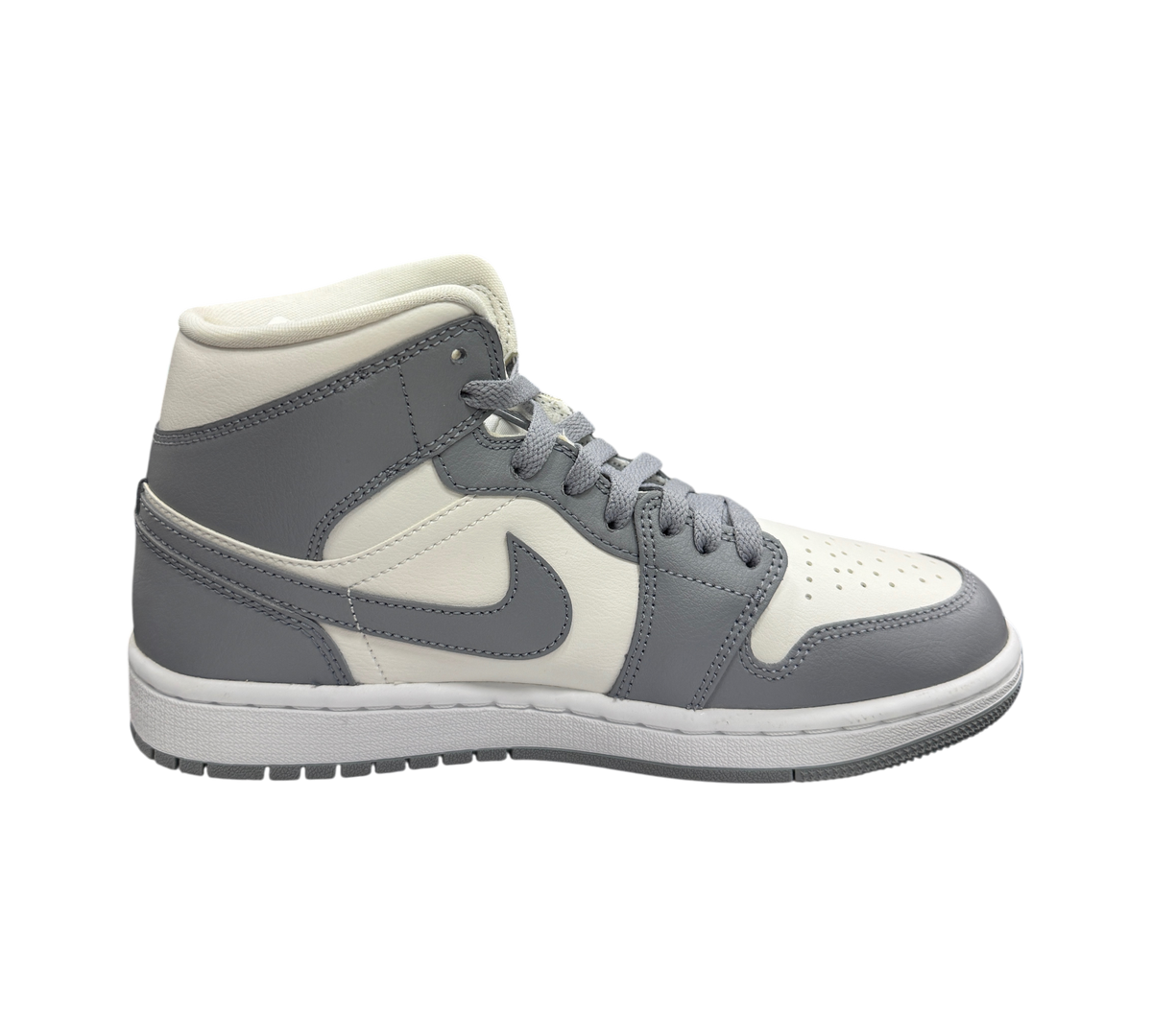 Genesis Boutique Jordan 1 Mid Stealth sneakers in white and grey leather with side profile view
