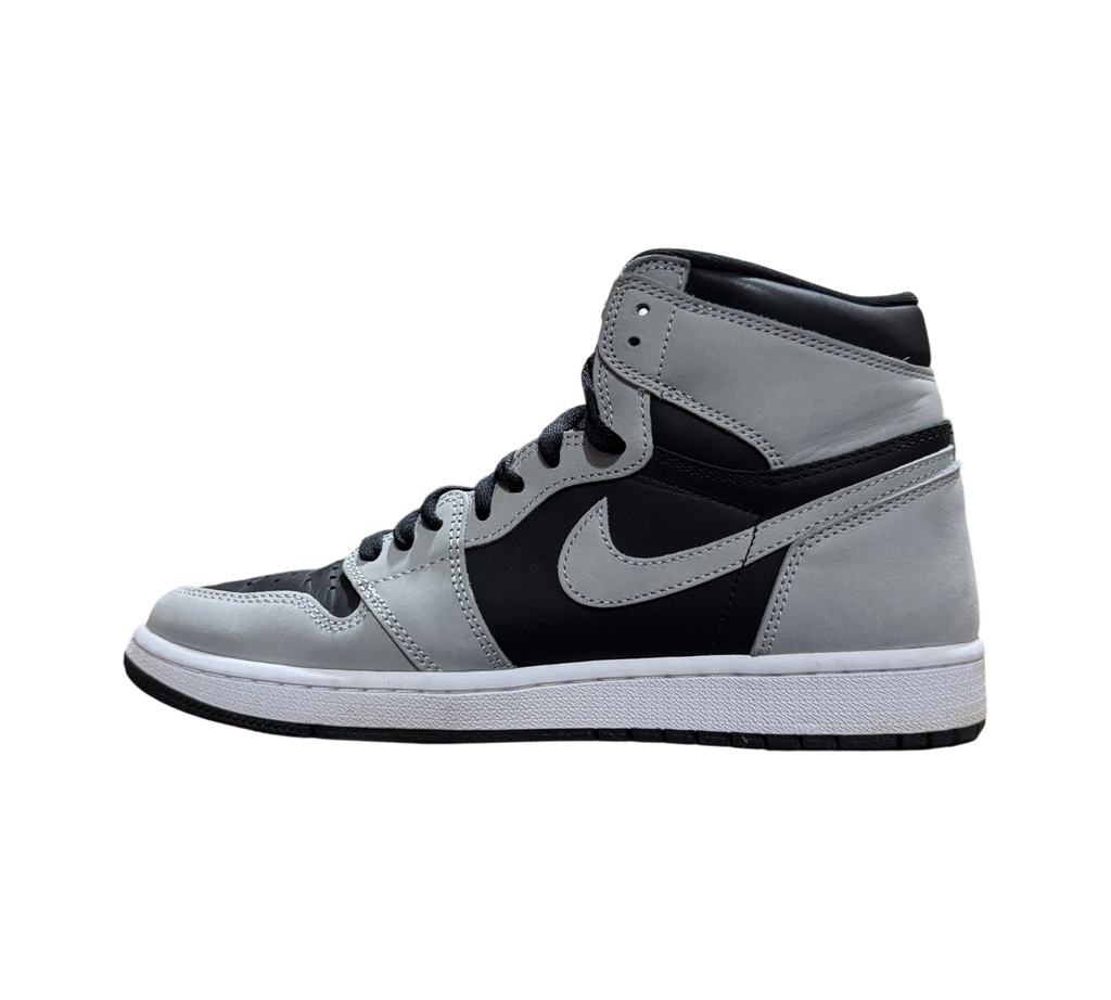 Genesis Boutique Jordan 1 Shadow 2.0 high-top sneakers in grey and black leather, side profile view.