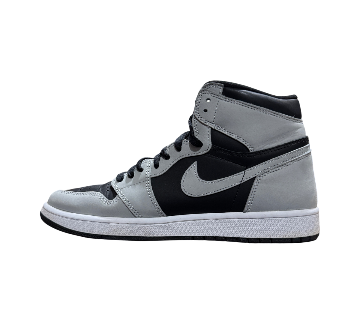 Genesis Boutique Jordan 1 Shadow 2.0 high-top sneakers in grey and black leather, side profile view.