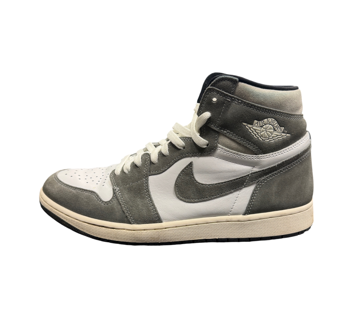 Genesis Boutique Jordan 1 Washed Black high-top sneakers in grey and white suede on a Nike shoebox