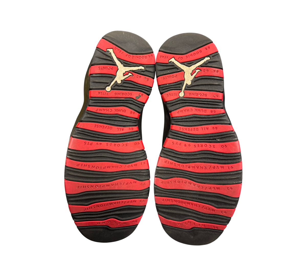 Genesis Boutique Jordan 10 Double Nickel sneakers showing black and red striped outsoles with career achievements