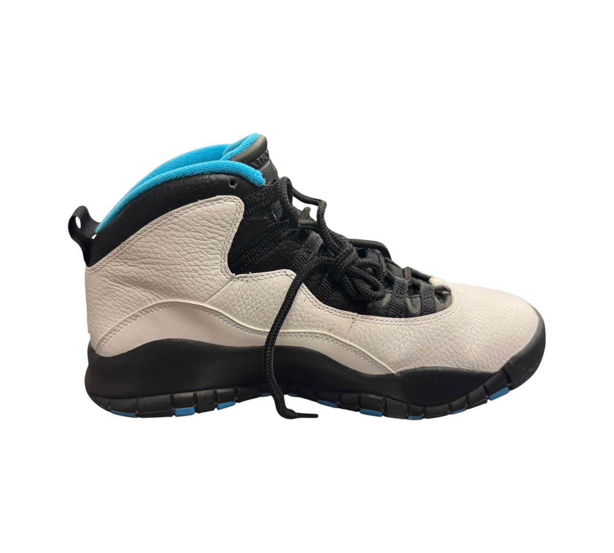Genesis Boutique pre-owned Jordan 10 Powder Blue sneakers featuring white leather, black accents, and blue lining.