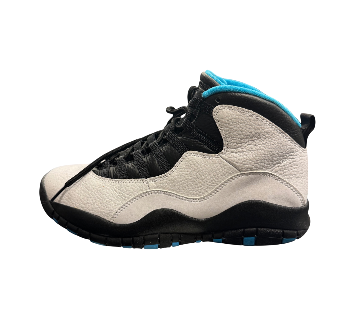 Genesis Boutique Jordan 10 Powder Blue sneakers in white and black leather with blue interior lining.
