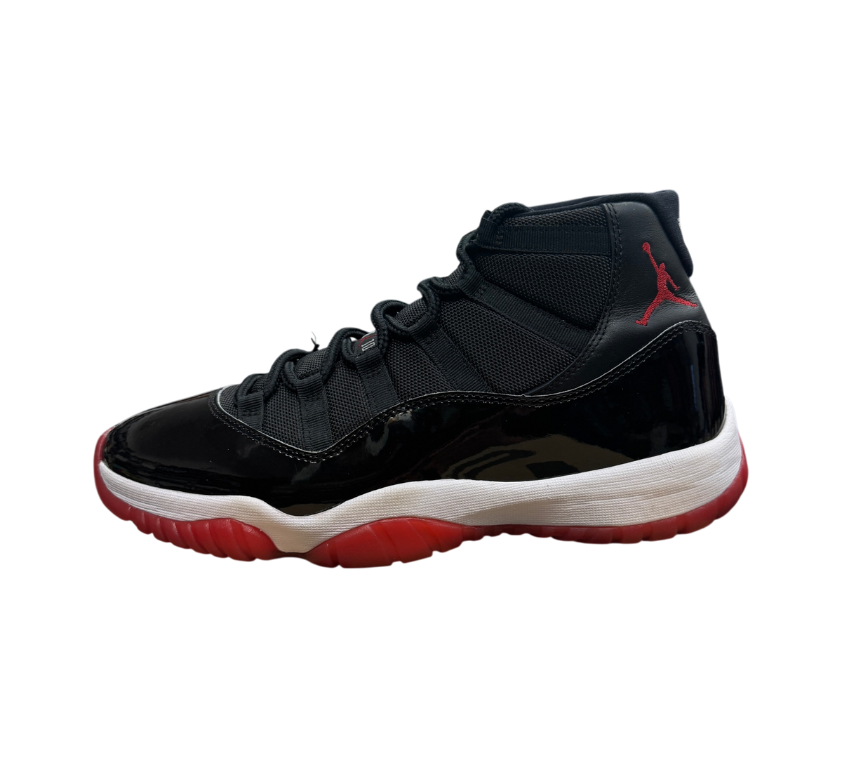 Genesis Boutique Jordan 11 Bred 2019 sneakers in black and red with patent leather mudguard and white midsole