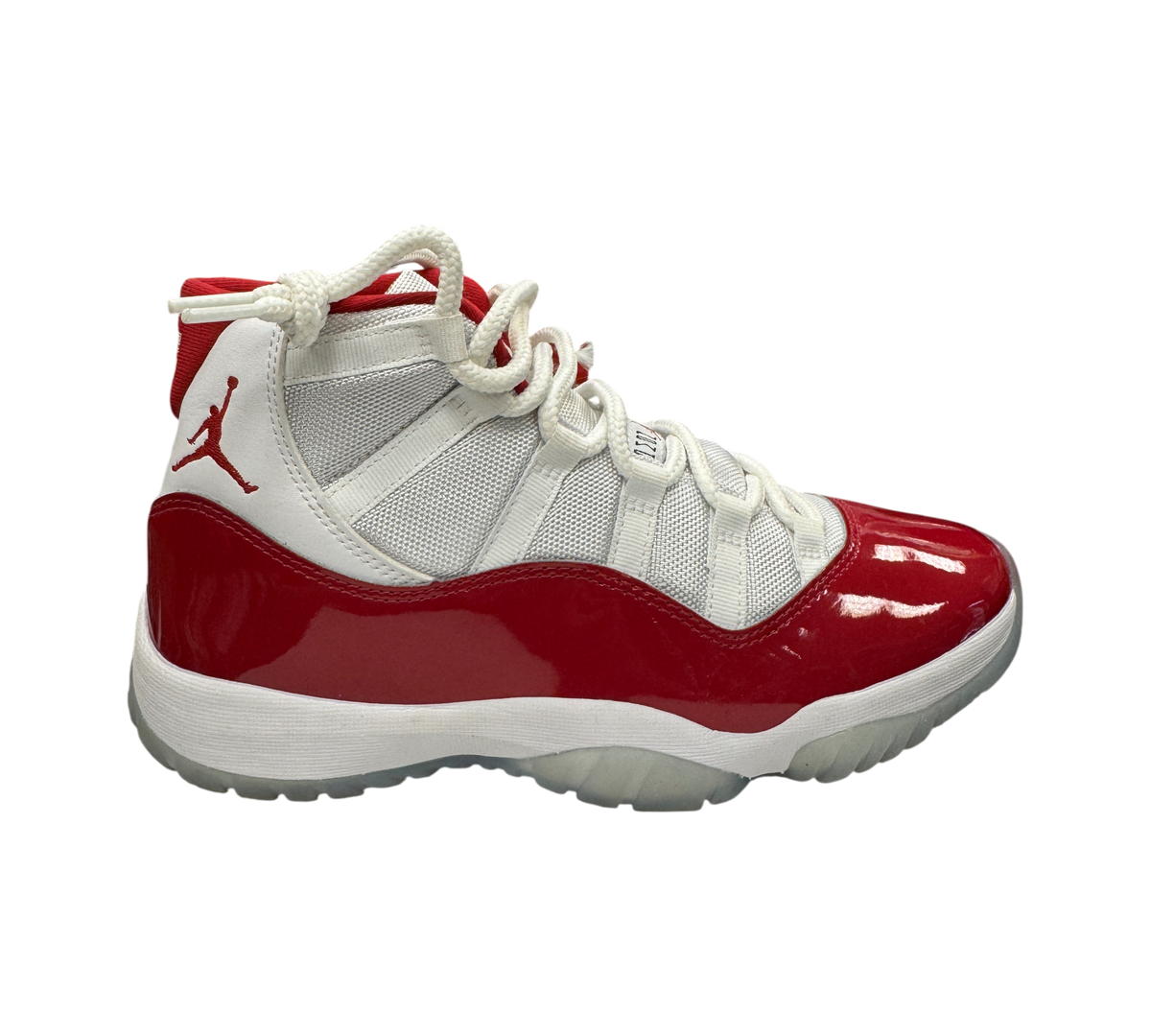 Genesis Boutique Jordan 11 Cherry sneakers featuring white mesh upper and glossy red patent leather mudguard