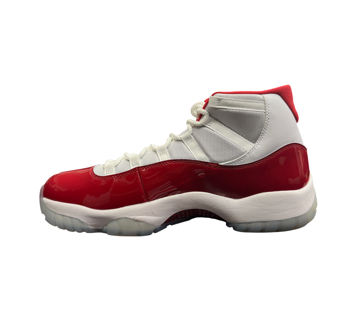 Genesis Boutique Jordan 11 Cherry sneakers featuring white mesh upper and glossy red patent leather mudguard