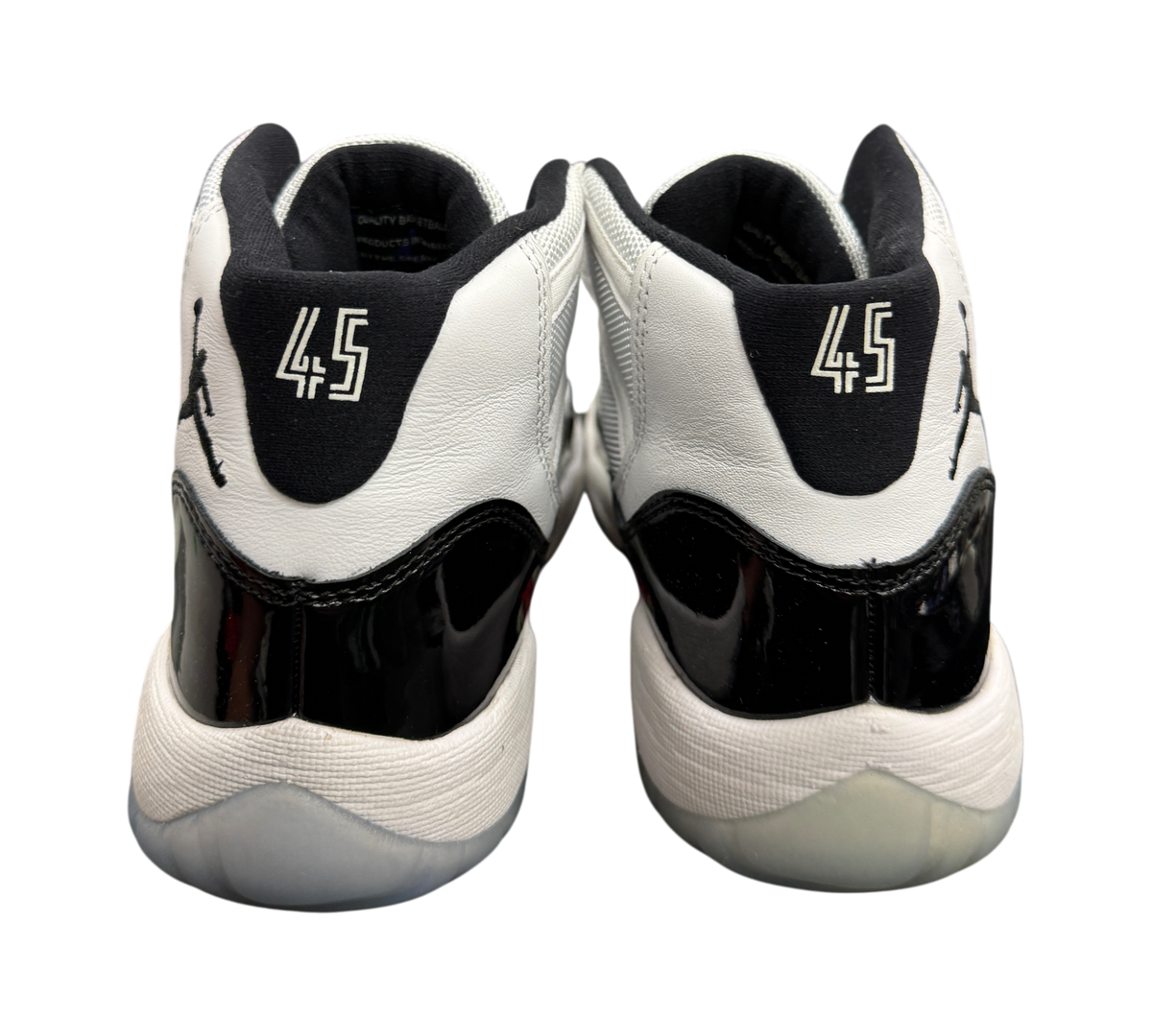 Genesis Boutique Jordan 11 GS Concord sneakers showing the back heel with number 45 and black patent leather detail