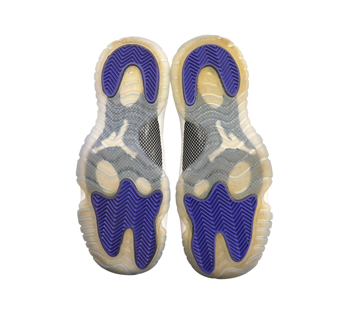 Genesis Boutique used Jordan 11 GS Concord sneakers showing purple and translucent rubber outsoles