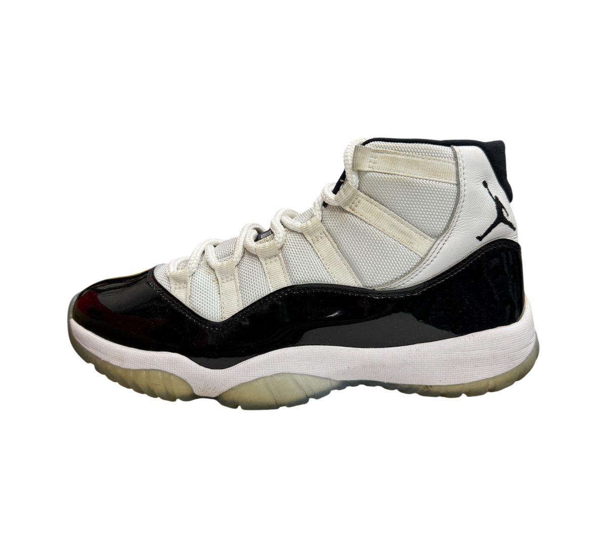 Genesis Boutique Jordan 11 Concord sneaker in white and black patent leather with translucent sole
