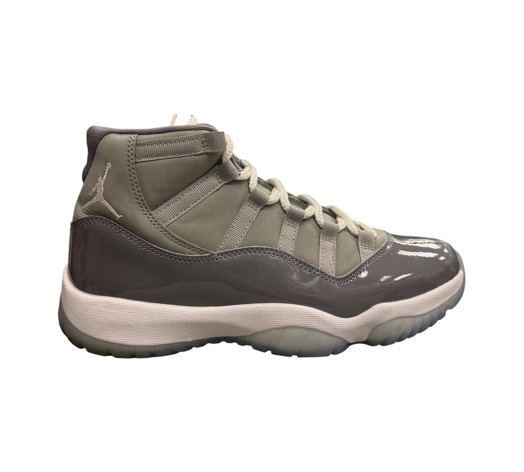Genesis Boutique pre-owned Jordan 11 Cool Grey sneakers with grey nubuck upper, patent leather mudguard, and icy sole.
