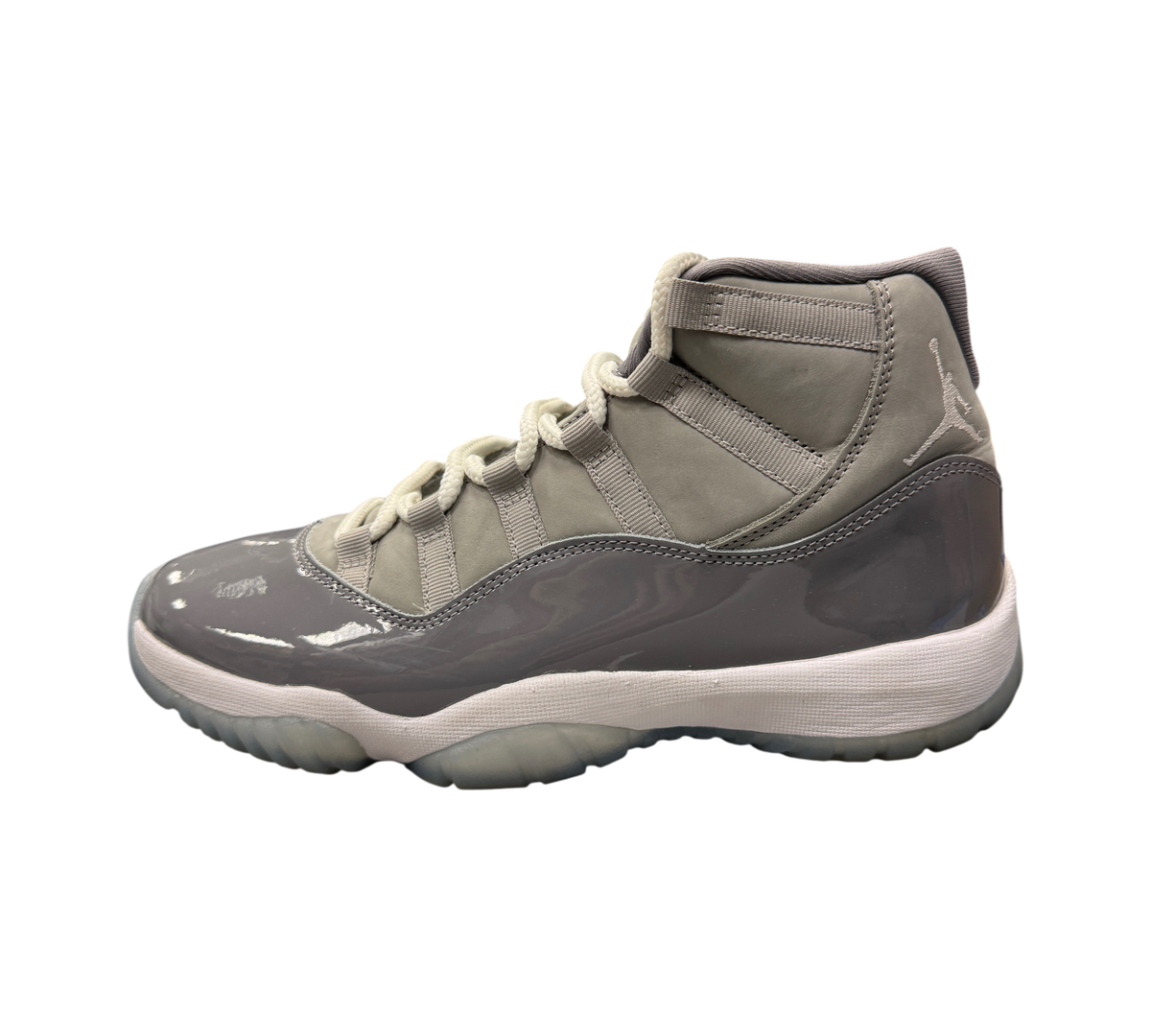 Genesis Boutique pre-owned Jordan 11 Cool Grey sneakers featuring grey nubuck, patent leather, and white laces.