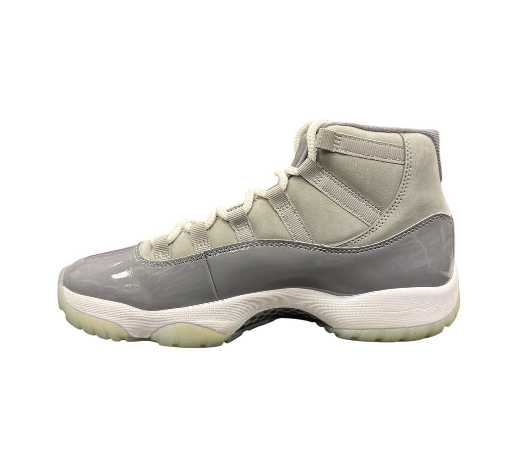 Genesis Boutique pre-owned Jordan 11 Cool Grey sneakers featuring grey nubuck, patent leather, and translucent soles.