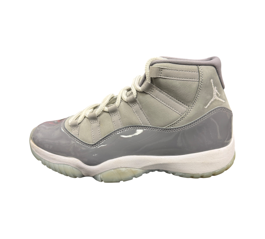 Genesis Boutique pre-owned Jordan 11 Cool Grey sneakers featuring grey nubuck, patent leather, and translucent soles.