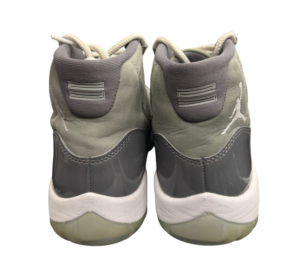 Genesis Boutique used Jordan 11 Cool Grey sneakers showing the grey patent leather heel and white midsole