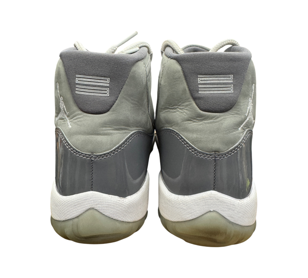 Genesis Boutique pre-owned Jordan 11 Cool Grey sneakers showing the grey patent leather heel and white midsole